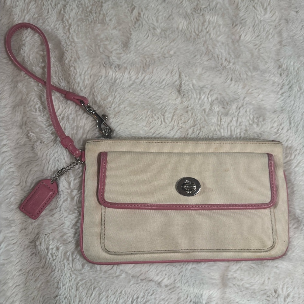 Pink and white coach wristlet